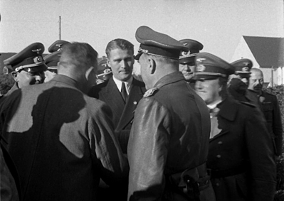 Wernher von Braun with General Emil Leeb, head of Army Weapons Office, and Fritz Todt, Minister of Armaments and Munitions, and Other German Army Officers at Peenemünde. Courtesy of Wikimedia Commons.