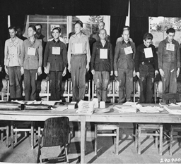 Defendants at Dora War Crimes Trial, beginning 7 August 1947 at Former Dachau Concentration Camp. Courtesy of Wikimedia Commons.