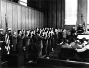 German 
Rocket Scientists and Engineers Sworn in as US Citizens as Part of 
Project Paperclip, 11 November, 1954, Redstone Arsenal, HSV AL. Courtesy
 of Wikimedia Commons.